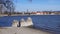 Tata Hungary 03 04 2017 tourists photograph the sacred statue of the holy George in Lake Tata