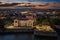 Tata, Hungary - Aerial view of the beautiful illuminated Castle of Tata by the Old Lake Ã–reg-to at dusk with colorful sunset