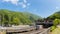 Tateyama station in Toyama city is interchange tram or tramcar to the japan alps with mountain