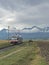 Tatra electric railway train with High Tatras in the backround, Slovakia