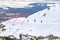 Tatranska Lomnica - 4.2.2022: Skiers and tourist at Skalnate Pleso mountain, High Tatras region, Slovakia. Near is the Lomnicky