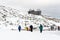 Tatranska Lomnica - 4.2.2022: Skiers and tourist at Skalnate Pleso mountain, High Tatras region, Slovakia. Near is the Lomnicky