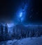 Tatras Mountains in winter at night with falling stars, Poland