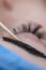 Tattoo Ideas. Beautician Tattooing Woman`s Eyebrows Using Special Equipment During Process of Permanent Make-up