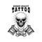 Tattoo studio emblem template. Crossed tattoo machine, skull, roses. Design element for logo, label, sign, poster, t shirt