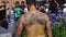 Tattoos on the back of a fan of Diego Maraudona