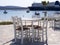 A tavern without customers amid a coronavirus pandemic on the waterfront and ferryboat of the resort town of Marmari on the Greek