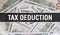 Tax Deduction text Concept Closeup. American Dollars Cash Money,3D rendering. Tax Deduction at Dollar Banknote. Financial USA
