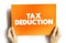 Tax deduction text quote on card, business concept background