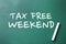 TAX FREE WEEKEND written on chalkboard