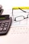 Tax preparation supplies, reading glasses and tax forms