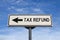 Tax refund road sign, arrow on blue sky background