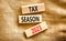 Tax season 2023 symbol. Concept words Tax season 2023 on wooden blocks on a beautiful canvas table canvas background. Business Tax