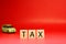 Tax word on blur car or vehicle  background - Red pattern of Business and Planning cost investment concept - Calculate Reduce Taxe