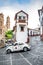 Taxco, Mexico - October 29, 2018. Tiny street with tiny house and typical beetle taxi