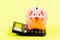 Taxes calculator. Accounting business. Piggy bank symbol money savings. Investments concept. Piggy bank pig and