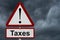 Taxes Caution Sign