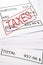 Taxes stamp on financial paper