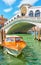 Taxi boat near Rialto bridge in Venice