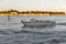 Taxi motor boat at sunset in Venice, Italy.