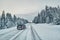 Taxi overtaking on a slippery winter road in Lapland, Finland