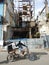 TAXI RICKSHAW AND RUINS OF A BUILDING, HAVANA, CUBA