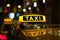 Taxi sign at night , taxi cars