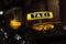 Taxi sign at night - taxi cars