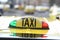 Taxi sign with red and green lights