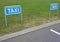 Taxi Signs at Empty Parking Place in Perspective