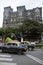 Taxis drive on a street in Mumbai