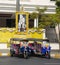 Taxis in front of the King`s Portrait in Bangkok