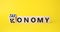 Taxonomy and economy symbol. Turned cubes with words Economy and Taxonomy. Beautiful yellow background. Business and Taxonomy and