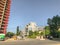 TBILISI, GEORGIA - - MAY 17, 2018: Privat houses on the hill, blossom trees against the blue sky