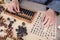 TCM doctors use traditional Chinese abacus to calculate the amount of medicine on prescription
