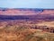 Te Colorado river, cutting through a landscape filled with red limestone rocks, Canyonlands National Park, UT, USA