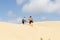 Te Paki Sand Dunes, enormous white dunes a favorite tourist attraction and fun place Northland, New Zealand