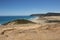 Te Werahi Beach and Cape Reinga as seen from the clay hills in Northland, New Zealand.