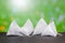 Tea in bags, green background, in pyramids