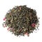 Tea blend of bergamot, rose petals, citrus aromas close-up, isolated on white.