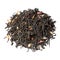 Tea blend of bergamot, rose petals, sage close-up, isolated on white.