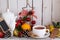 Tea cup with decorations, cookies and oranges for Christmas
