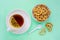 Tea cup with pretzel cookies, stock photo