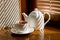 Tea cup with teapot