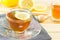 The tea with honey and lemon on wood background,warm toning, selec