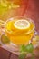 Tea with lemon on a wooden table.Cup of tea with fragrant tea, standing on a wooden table,