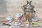 Tea party samovar, cups and teapot on a summer day. Russian tradition