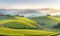 Tea plantation fields, cascade valley landscape with mount, scenery of meadows with mountains backdrop, terraced agriculture.