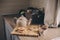 Tea pot and cookies in rustic grey kitchen interior. Slow living in country house concept