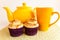 Tea set with caramel cupcakes